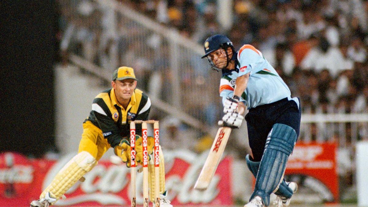 Sachin Tendulkar driving in the blue India jersey under the Sharjah lights, 1998
