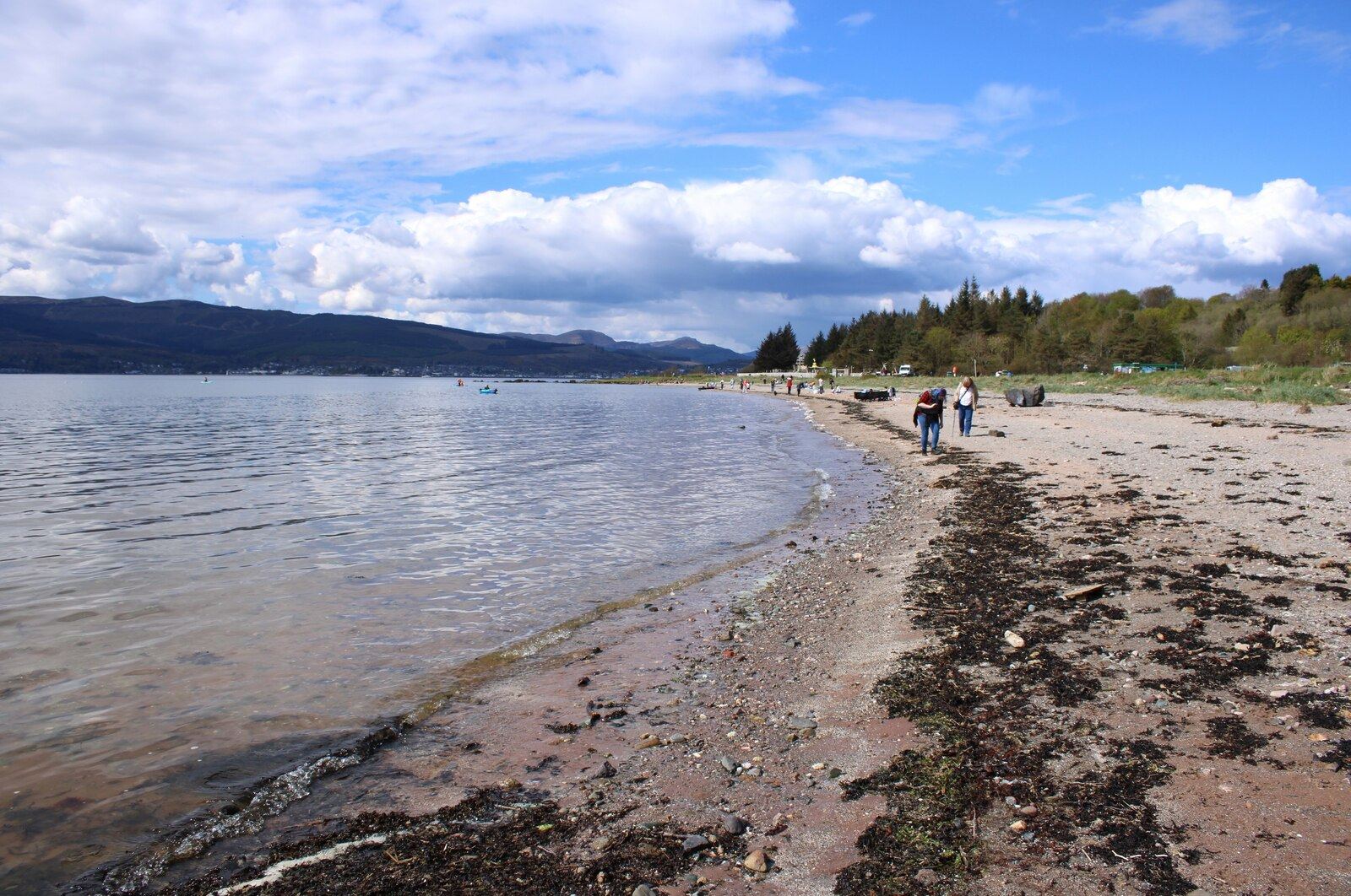 Lunderston Bay, a small sandy beach on the Firth of Clyde with hills across the water