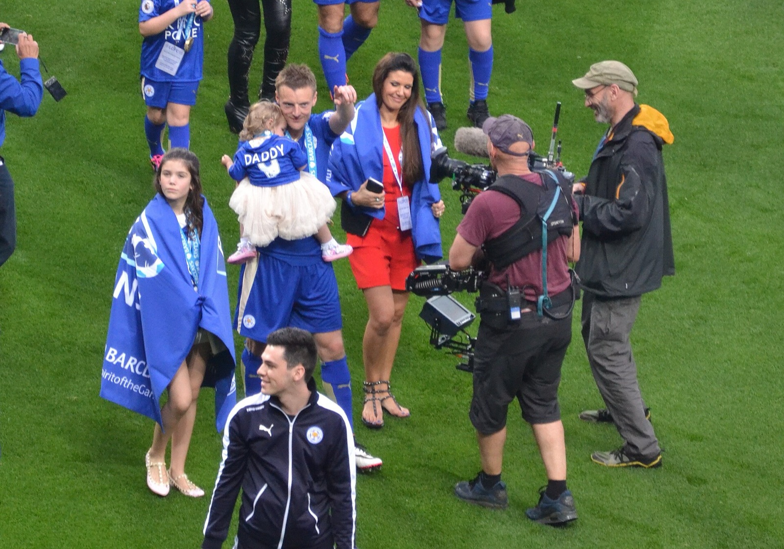 Jamie Vardy and his family on the pitch on the day Leicester lifted the trophy, May 2016.