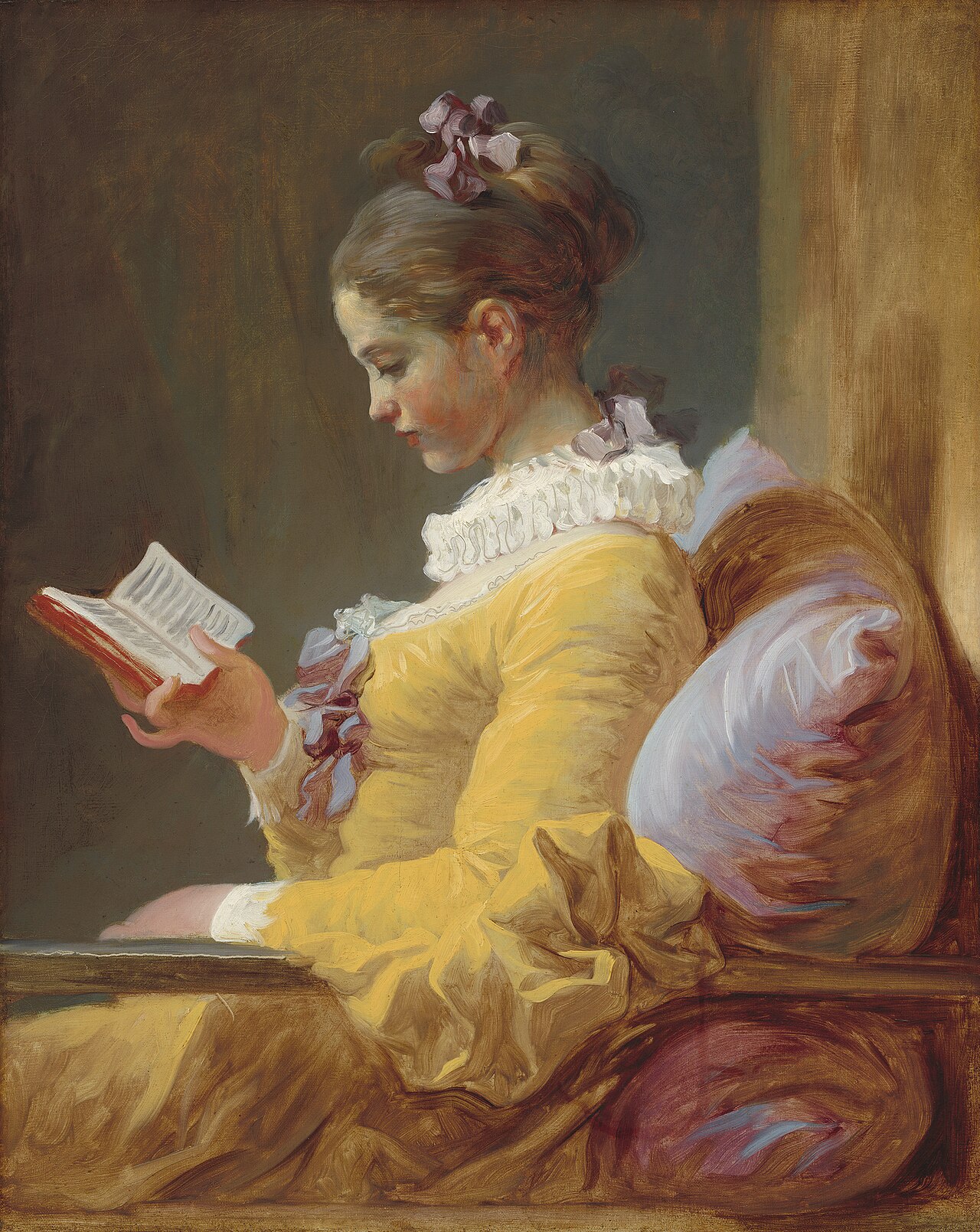 A young girl reading