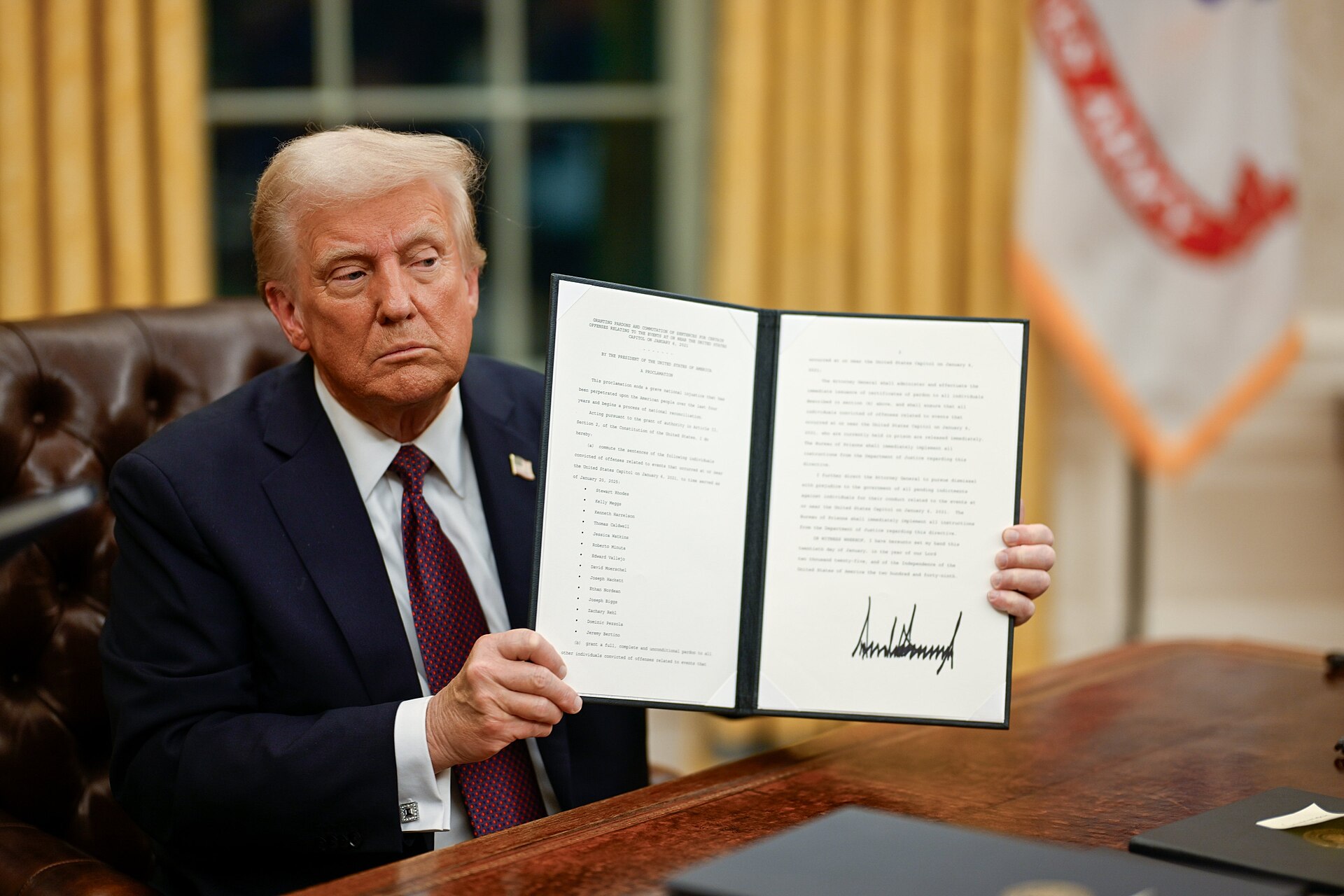 President Trump signs an executive order in the Oval Office, 2025